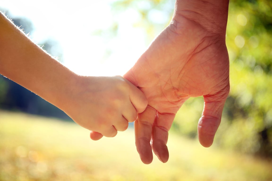 Parent and Child Holding Hands 